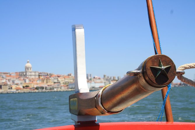 2-Hour Lisbon Traditional Boats Sunset Cruise with White Wine - Getting Onboard Near Praça do Comércio: the start that sets the mood