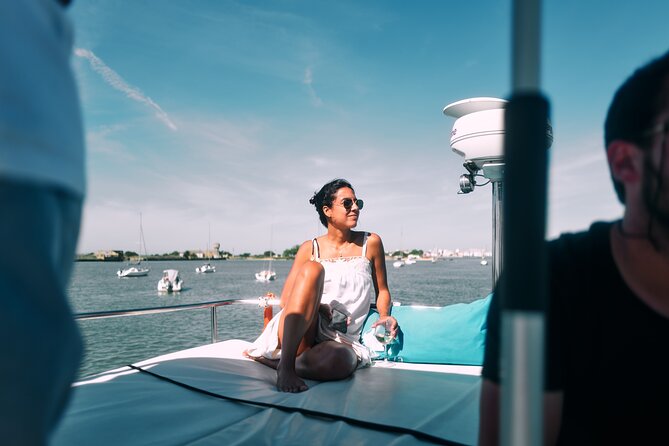 4 Hours Private Tour with Dives in Catamaran in Lisbon - Oeiras: the calm bay stop with swimming and a cocktail option