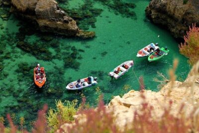 Algarve private day tour from Lisbon - Praia da Rocha: boardwalk time at a classic Algarve beach