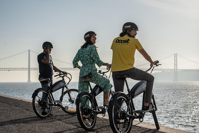 Belém E-Bike Guided Tour Explore Lisbon by the river - The dock area and the 25th of April Bridge photo moment