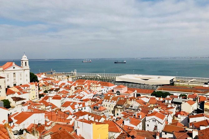 City of Neighborhoods Tour 1H 30M Private Tour by Tuk Tuk - Feira da Ladra: an old used goods fair tradition