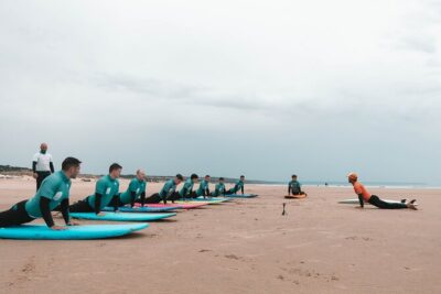 Dedicated Surf Experiences in Costa da Caparica, near Lisbon - Yoga warm-up plus a real safety briefing (not just rules on a poster)
