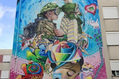 Discover Lisbon's Best Street Art - Mouraria and the Walled-City Feel: Castelo, Alfama, and the Art That Lives in Alleys