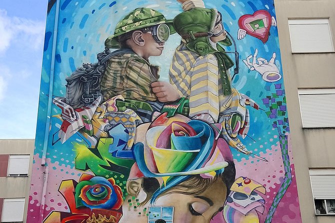 Discover Lisbon's Best Street Art - Mouraria and the Walled-City Feel: Castelo, Alfama, and the Art That Lives in Alleys