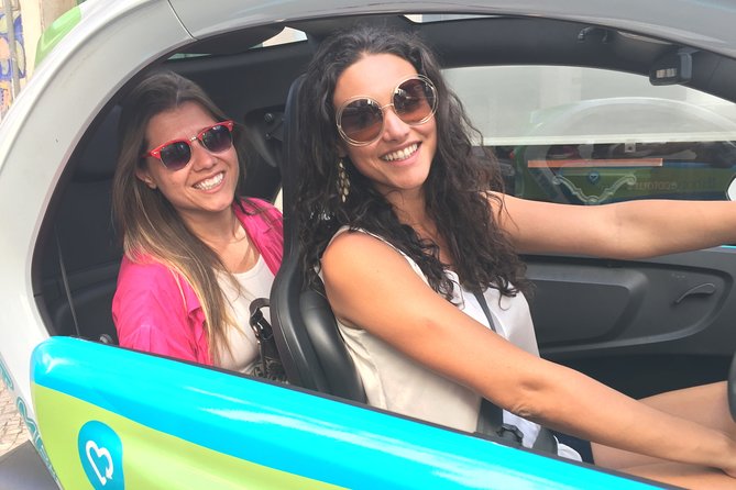 Electric Car with GPS Audio Guide Full Day Tour in Lisbon - Praça do Rossio and Baixa: Lisbon’s nerve center on foot