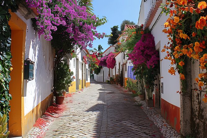 Fatima, Batalha, Nazare, Obidos Small Group Tour From Lisbon - Óbidos: medieval walls, narrow streets, and ginjinha