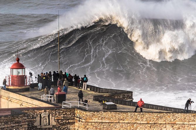 Fátima, Nazaré and Óbidos Private Tour from Lisbon - Nazaré fishing village: surf-wave legend and local crafts in short time