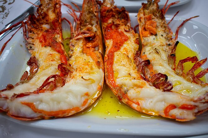 Food & Drink Private Tour in Lisbon & Cacilhas w/ Ferry Included - Cacilhas dinner: mixed fish dishes and the petiscos rhythm