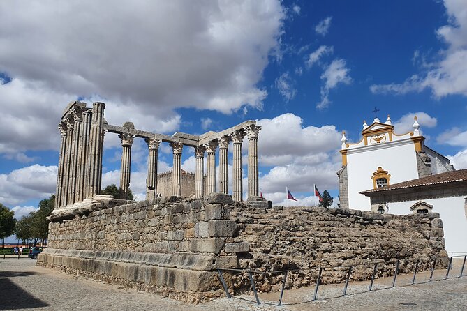 From Lisboa: Evora & Monsaraz Private Full Day Tour - Monsaraz: medieval walls, Templar history, and Alqueva Lake views