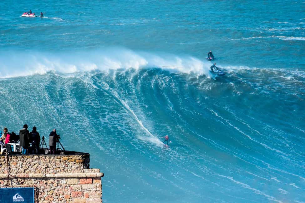 From Lisbon: Nazare Big Waves and Óbidos Guide Day Trip - Nazaré: lighthouse views, cliffs, and the fishing-town heartbeat