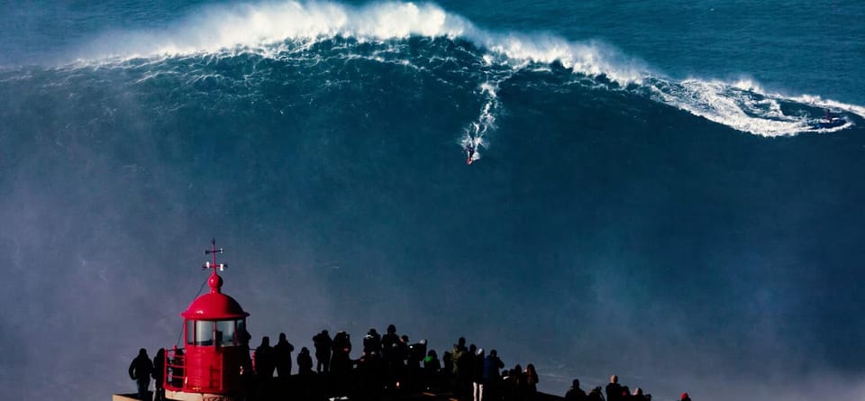 From Lisbon: Nazare Big Waves and Óbidos Guide Day Trip - Getting a second look at the ocean: beach-level perspective