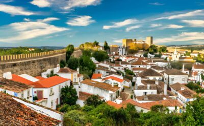 From Lisbon: Obidos, Nazaré and Fátima Small Group Tour - How the Lisbon pickup and small-group van work
