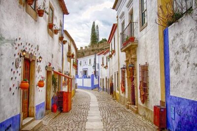 From Lisbon : Óbidos & Nazaré Giant Waves, Ginja & Small Group - Nazaré: Fishing-Port Traditions and the Surf-View Reality Check
