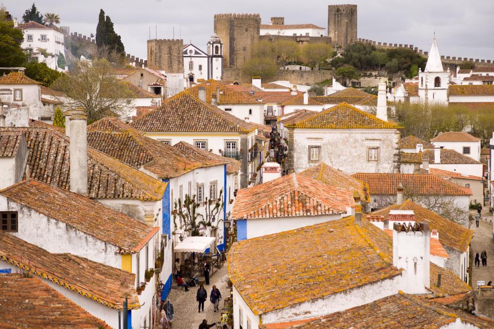 From Lisbon: Shared Tour to Fátima, Óbidos, Batalha e Nazaré - Óbidos’ medieval lanes and hilltop castle views