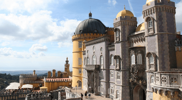 From Lisbon: Sintra Pena Regaleira Roca Cap Cascais Tour - Sintra Historic Center: medieval vibe, plus a pastry stop