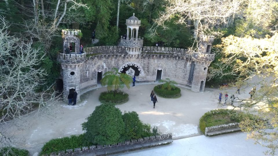 From Lisbon: Sintra Private tour Half-Day in a premium car - Quinta da Regaleira: Sculptures, Gardens, and the Initiation Well