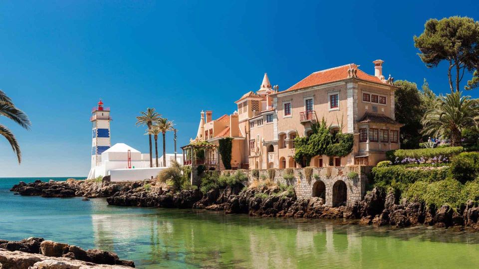From Lisbon: Tour Sintra, Pena Palace, Regaleira and Cascais - The return drive: Lisbon landmarks from the shore line perspective
