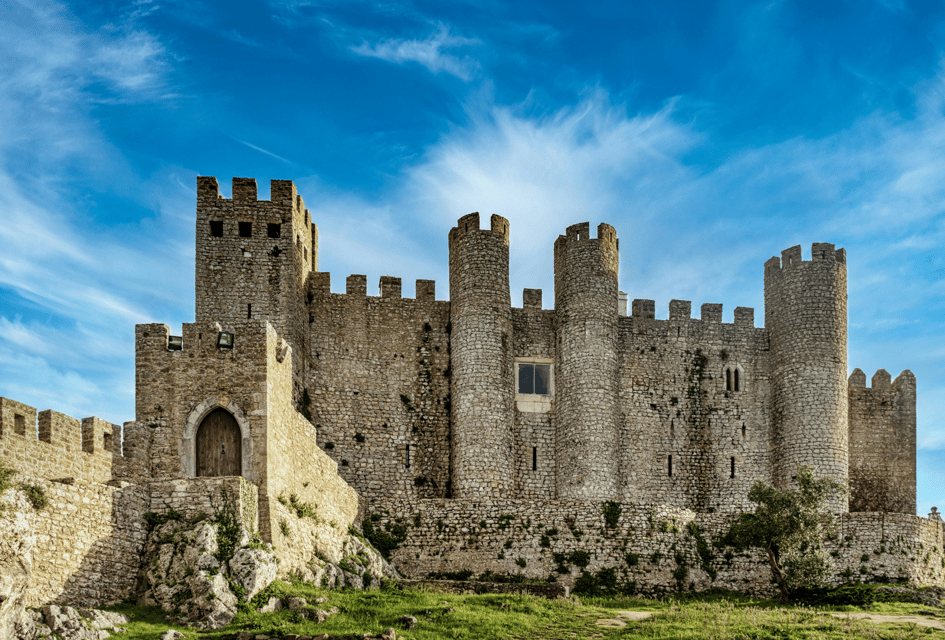 From Lisbon: Tour to Óbidos and Nazaré - Medieval Village, Sour Cherry and Iconic Beaches - Óbidos Medieval Walls: Walking the Ramparts Like You Mean It