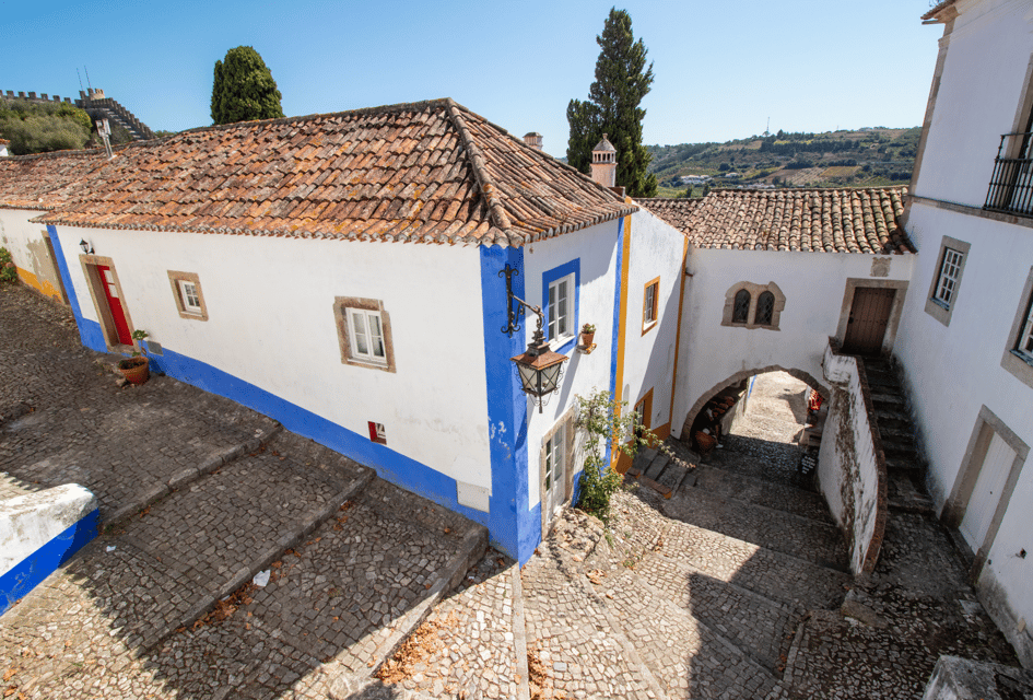 From Lisbon: Tour to Óbidos and Nazaré - Medieval Village, Sour Cherry and Iconic Beaches - Transportation and Timing: Why the 8 Hours Feel Right