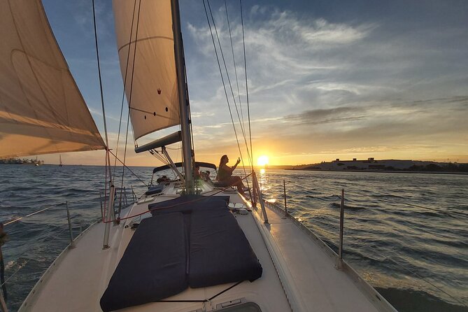 Golden Hour Boat Tour - Sailing by the Monuments with Wine - Meeting at Doca de Santo Amaro: How to Start Without Stress