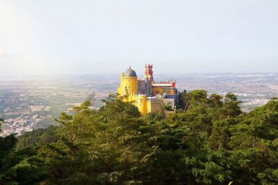 Half Day Shared Tour to Sintra with Licensed Guide - Getting picked up at BessaHotel Liberdade and heading toward Pena