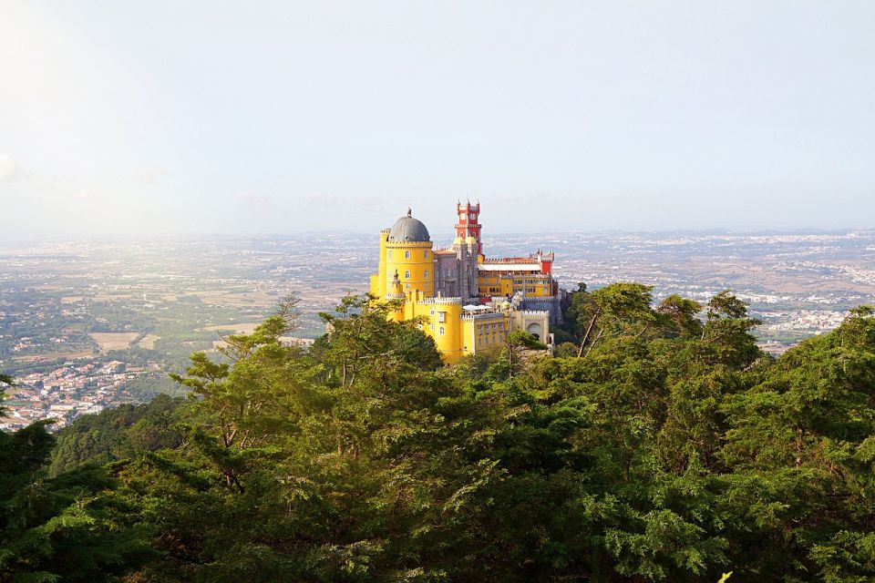 Half Day Shared Tour to Sintra with Licensed Guide - Getting picked up at BessaHotel Liberdade and heading toward Pena