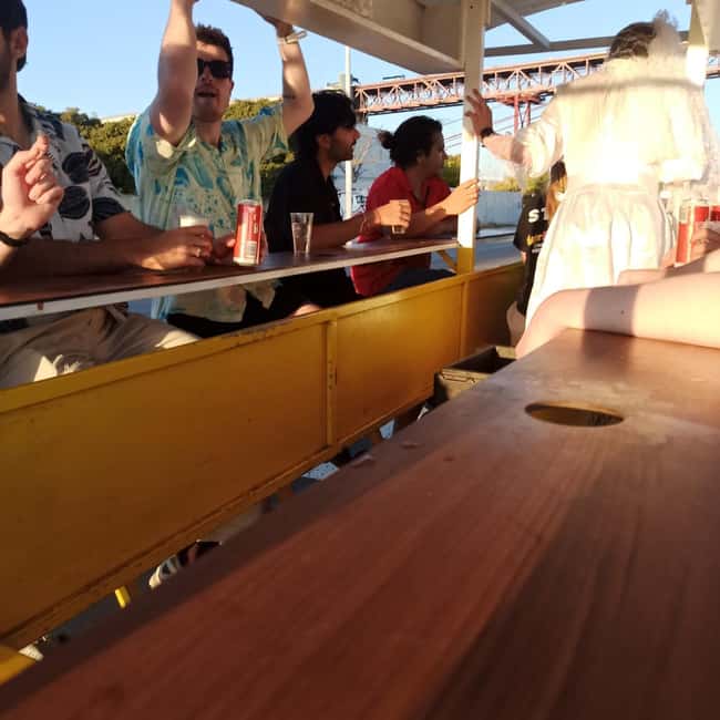 Lisbon: 1-Hour Beer or Sangria Bike Sightseeing Tour - The ride structure: timing, breaks, and who it suits
