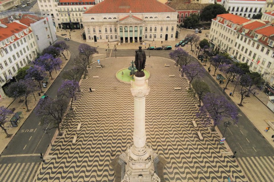 Lisbon: 2-Hour Private City Highlights Kickstart Tour - Rossio Station and the walk toward Rua das Portas de Santo Antão