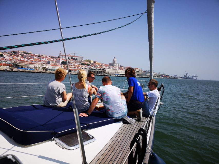 Lisbon: 2-Hour Sailing Yacht Cruise & Guided Tour w/2 drinks - The Rua Augusta Arch and Praça do Comércio: Rebuild History You Can Actually See