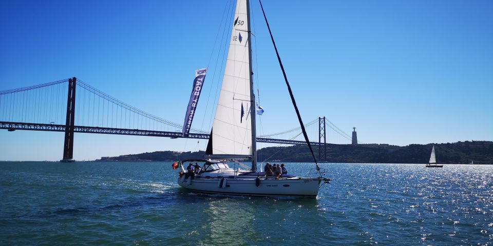 Lisbon: 2-Hour Sailing Yacht Cruise & Guided Tour w/2 drinks - São Jorge’s Moorish Castle Against the 1998 Expo Site