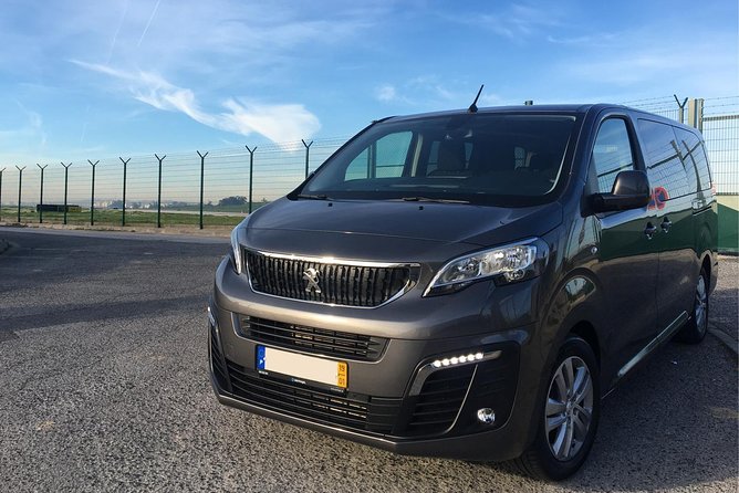 Lisbon Airport Group Transfer to Cascais or Estoril (Van Service) - Meeting Your Chauffeur in Lisbon: Arrivals Hall, Then Van Time