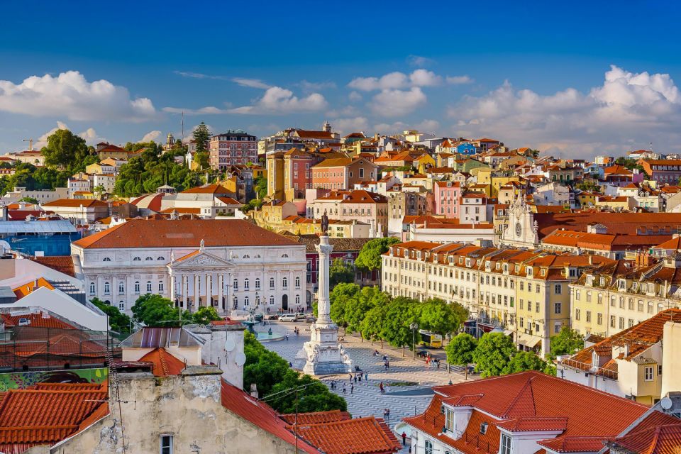 Lisbon: Alfama, Bairro Alto and Downtown Walking Tour - Entering Lisbon by Funicular: Glória and the View Logic