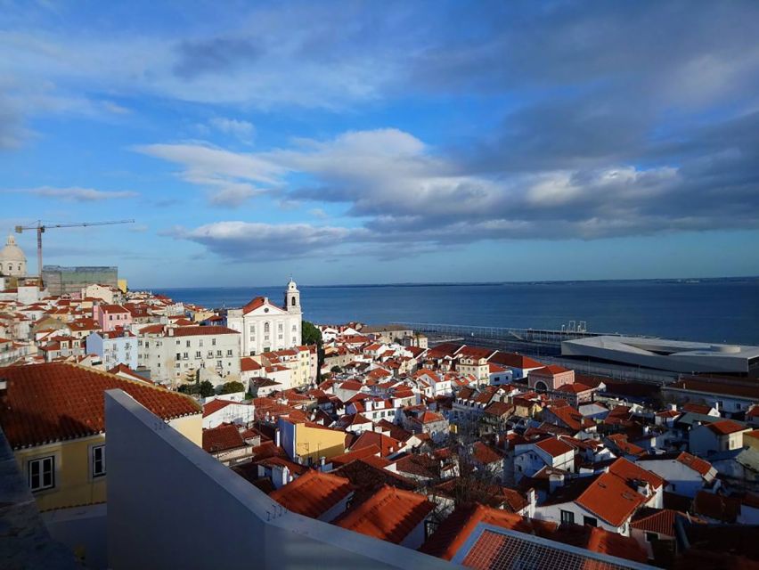 Lisbon: Alfama, Mouraria Neighborhood Walking Tour - Ginjinha in a local tavern: tasting Lisbon with your ears and eyes