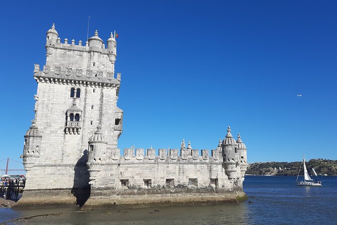 Lisbon: Belem Walking Tour with Jeronimos Monastery Tks Included - Praça do Império gardens: empire in 32 coats of arms