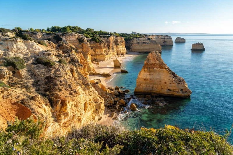 Lisbon: Benagil, Algar Seco, Portimao & Lagos Private Tour - Portimão and Marine Beach: cliffs, rock shapes, and a good reset