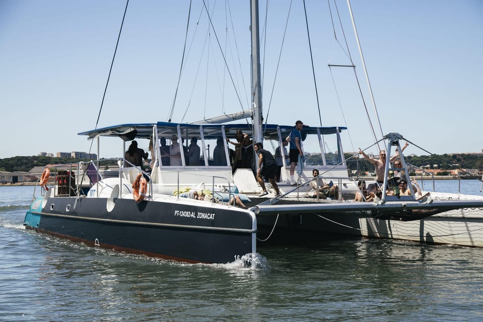 Lisbon: Catamaran Boat Party with Music, Open Bar & Dives - Key highlights you’ll actually feel during the cruise