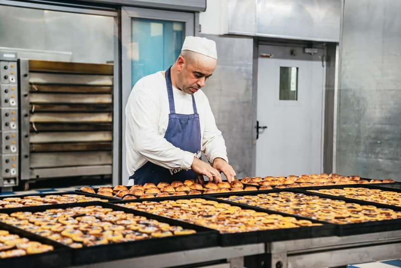 Lisbon City Half Day Private Guided Tour: Iconic Attractions - Pastéis de Belém: the classic custard break (and where shopping fits)