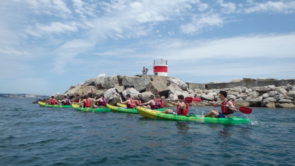 Lisbon: Coast Guided Kayak Tour - Beach time: Praia de Carcavelos and the swim break