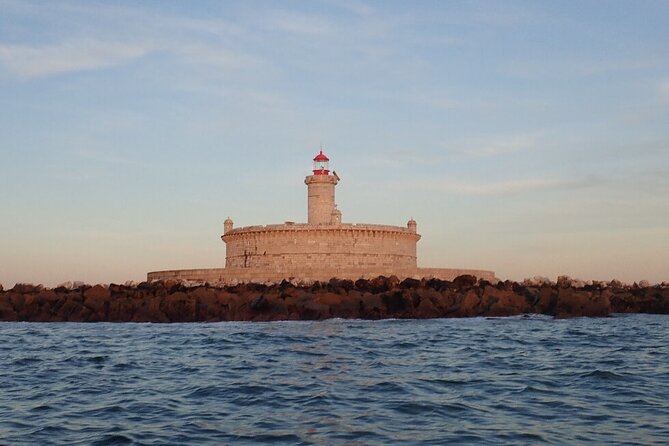 Lisbon Coast Tour by Boat - Torre de Belém from the water: best angles and the Henry the Navigator link