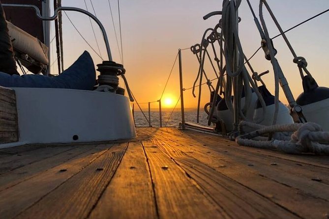 Lisbon - Daylight or Sunset on a Vintage Sailboat - Cristo Rei across the Tagus: WWII gratitude in monumental form