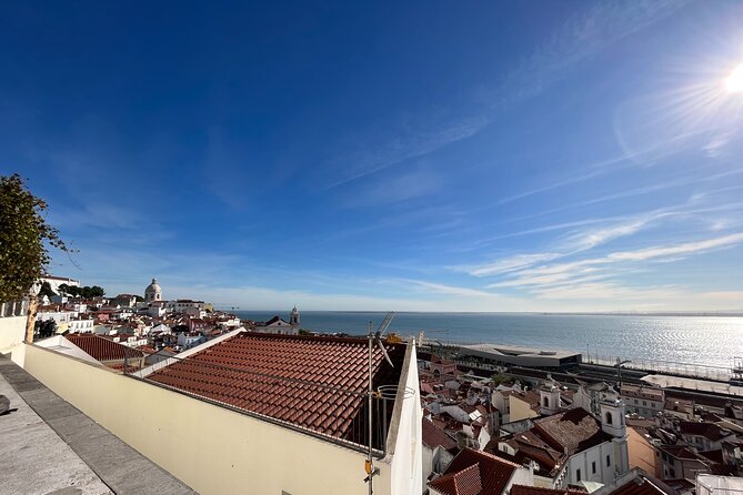 Lisbon Downtown & Alfama with a guide Walking tour - Augusta Street Arch to Praça do Comércio: the Portugal story in one stretch