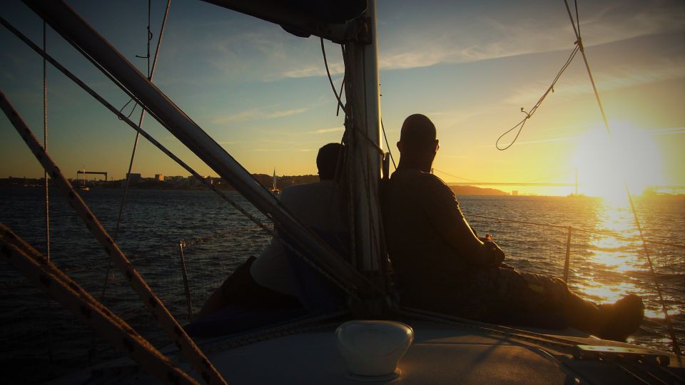 Lisbon: Enjoy a Sunset or Night Tagus River Sailboat Cruise - Old forts, prisons, and the big bridge moment on the south bank