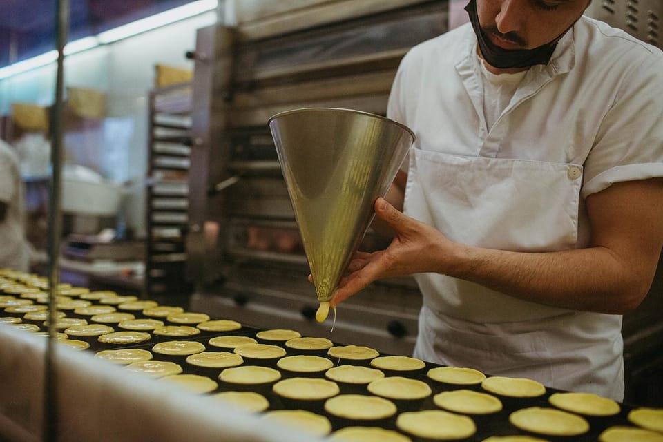 Lisbon: Evening Food & Wine Tour in Bairro Alto - Manteigaria and the sweet finish in Chiado/Bica