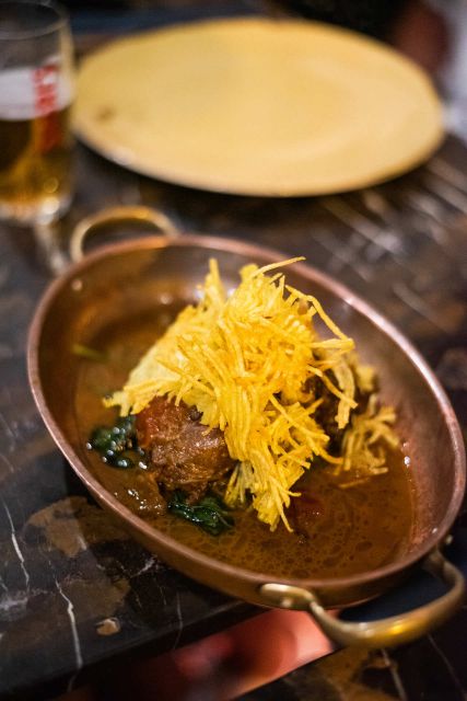 Lisbon: Fado & Food Tour with Live Show & Traditional Dinner - Alfama and Mouraria: the streets that explain saudade