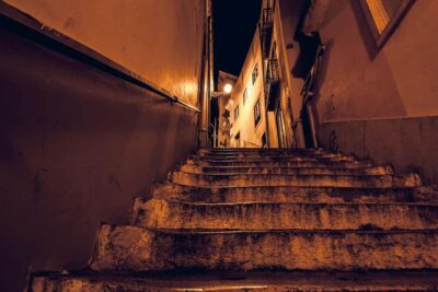 Lisbon: Fado Show with Dinner and City Tour - Alfama at Night: The Neighborhood That Makes Fado Make Sense