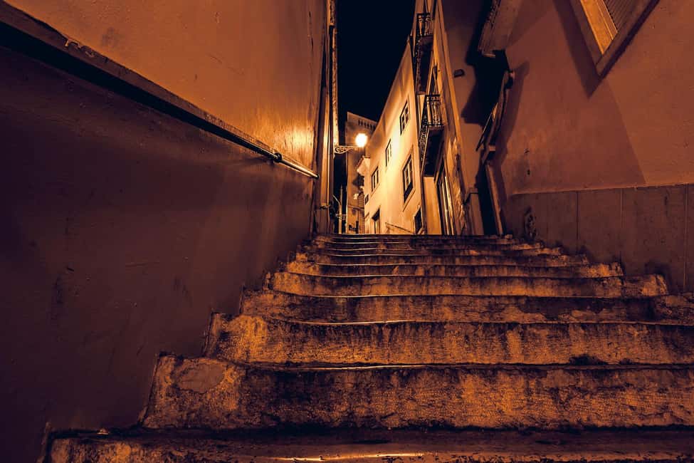 Lisbon: Fado Show with Dinner and City Tour - Alfama at Night: The Neighborhood That Makes Fado Make Sense
