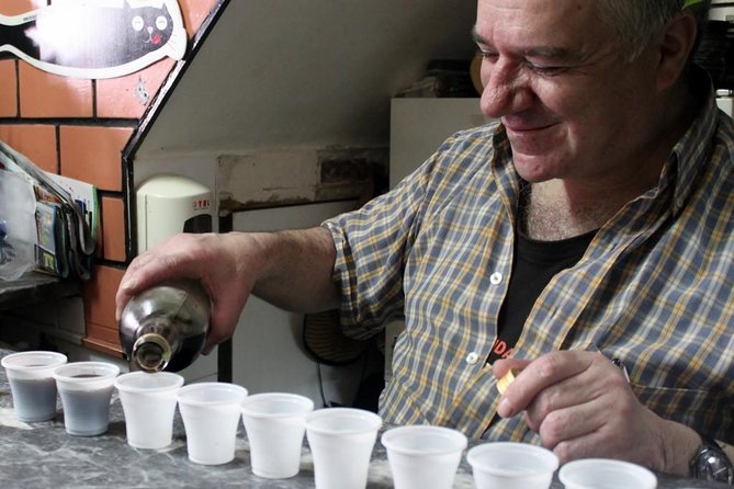 Lisbon Food and Culture: 3 Hour Walking Tour - Another local lunch-style stop: codfish cake and bifana with locals