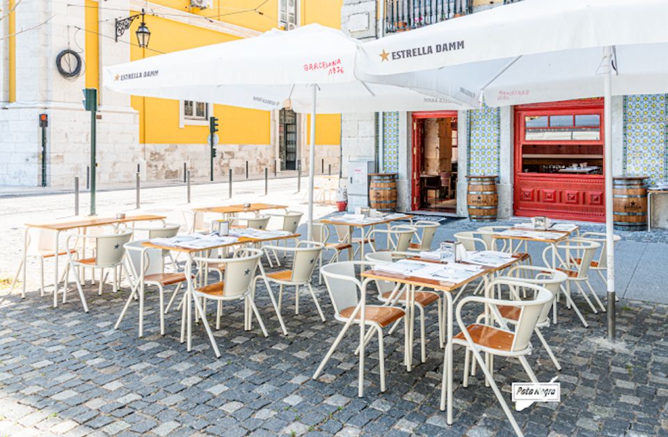 Lisbon Food and Wine Tastings (3 Restaurants) - Cheese, Pata Negra cured ham, and Port wine: the salty-sweet finale