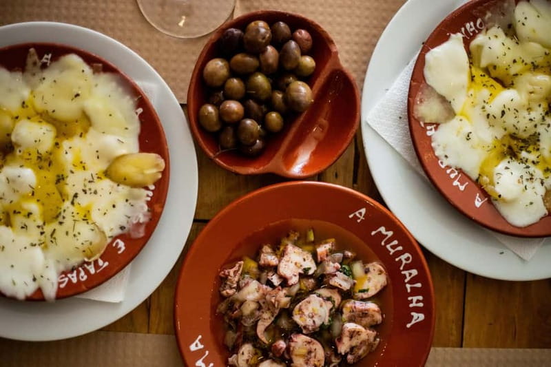 Lisbon: Food Tasting Tour by Tuk Tuk with 2 Stops - Guide-led storytelling across old streets and Lisbon life