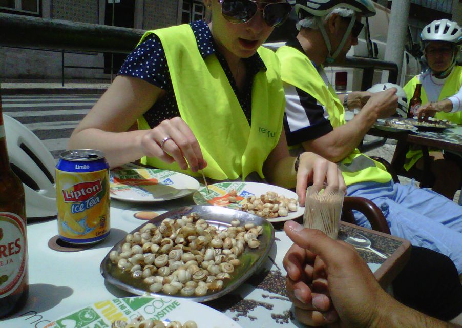 Lisbon: Go Taste Electric Bike Tour - Mouraria in Dona Tina: sardines or soup and the end-of-tour payoff
